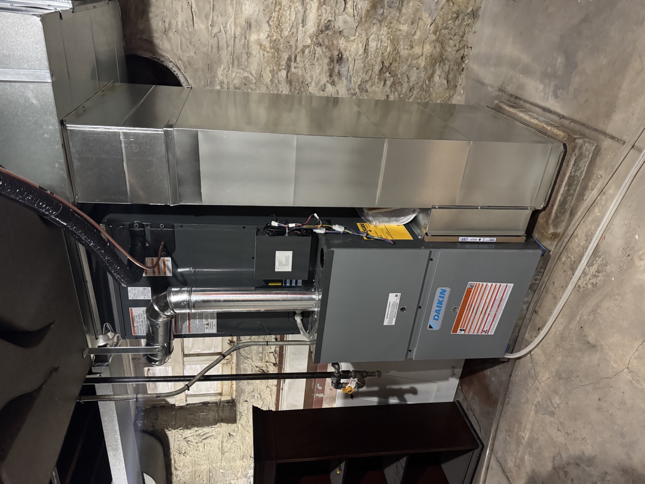 Clean high-efficiency Daikin furnace installation by Degenhardt Heating and Cooling in a South St. Louis home