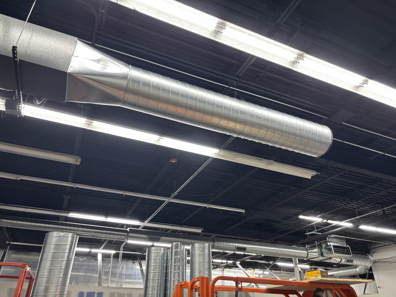 Custom Local 36 union sheet-metal spiral ductwork fabricated by Degenhardt Heating and Cooling